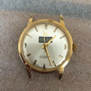 Men’s vintage gold watch face